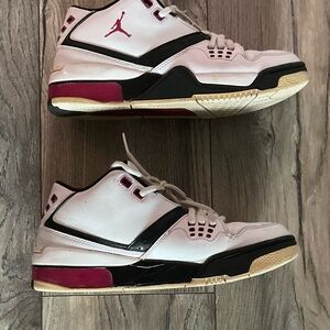 White, black and Red jordan sneakers. Size youth 6. Preowned but great for resto